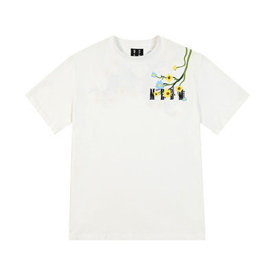 Camiseta oversize con bordado floral: camiseta urbana de moda