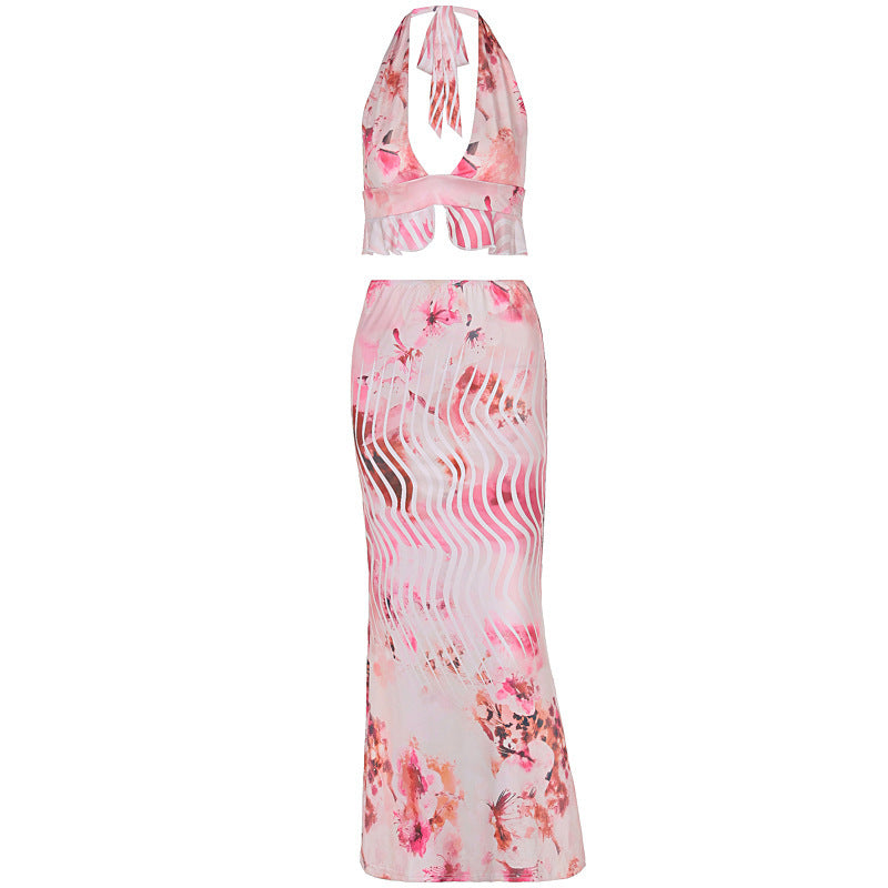 Pink floral halter outfit

Tie-back crop top and skirt set

Women's vacation floral outfit

Lightweight summer co-ord

Beach party outfit for women

Flowy maxi skirt set

Garden brunch outfit

Boho chic summer matching set

Feminine floral two-piece outfit

Cute tropical outfit for vacation