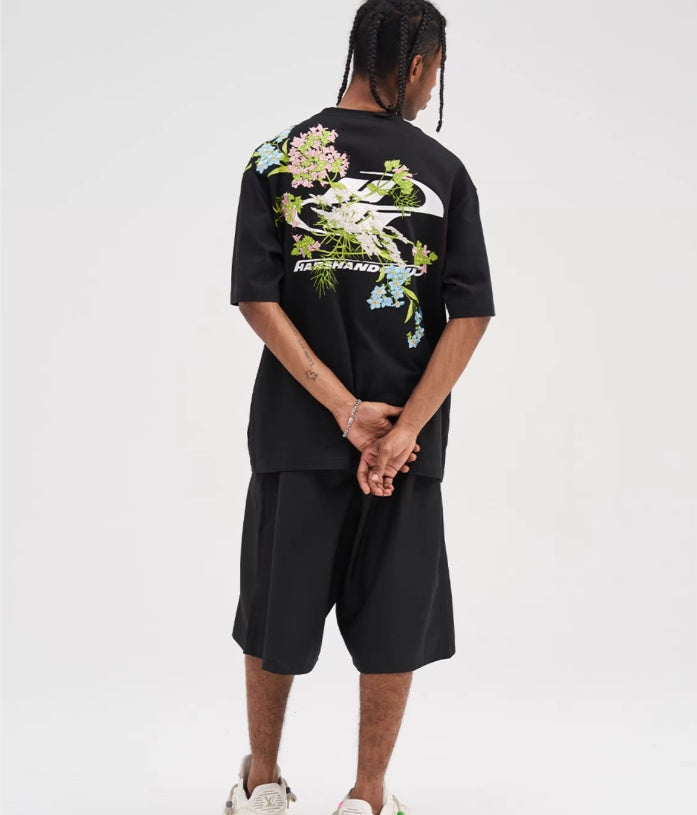Oversized embroidered t-shirt
Floral embroidery t-shirt
Streetwear embroidered tee
Designer embroidered t-shirt
Unisex oversized t-shirt
Trendy streetwear fashion
High-quality embroidery tee