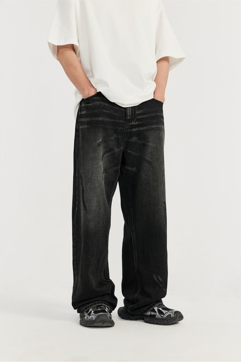 men's wide-leg jeans, black denim jeans, vintage washed jeans, loose-fit jeans, casual streetwear, urban fashion, baggy denim, relaxed fit jeans, trendy men's denim.