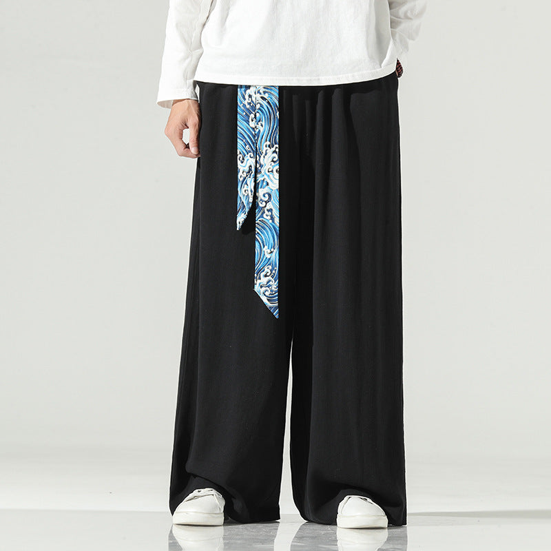 Men’s wide-leg harem pants,
Japanese-inspired pants,
Black harem pants,
Loose fit trousers,
Wide-leg trousers for men,
Boho-inspired pants,
Casual men’s pants,
Relaxed fit trousers,
Flowing pants for men,
Cultural fashion pants
Men’s casual trousers,
Contemporary men’s pants,
Unique men’s trousers,
Statement pants for men,
Stylish harem pants,
Blue wave pattern pants,
Men’s baggy pants.
Comfortable black trousers,
Trendy wide-leg pants,
Versatile harem pants,
Fashion-forward men’s trousers,