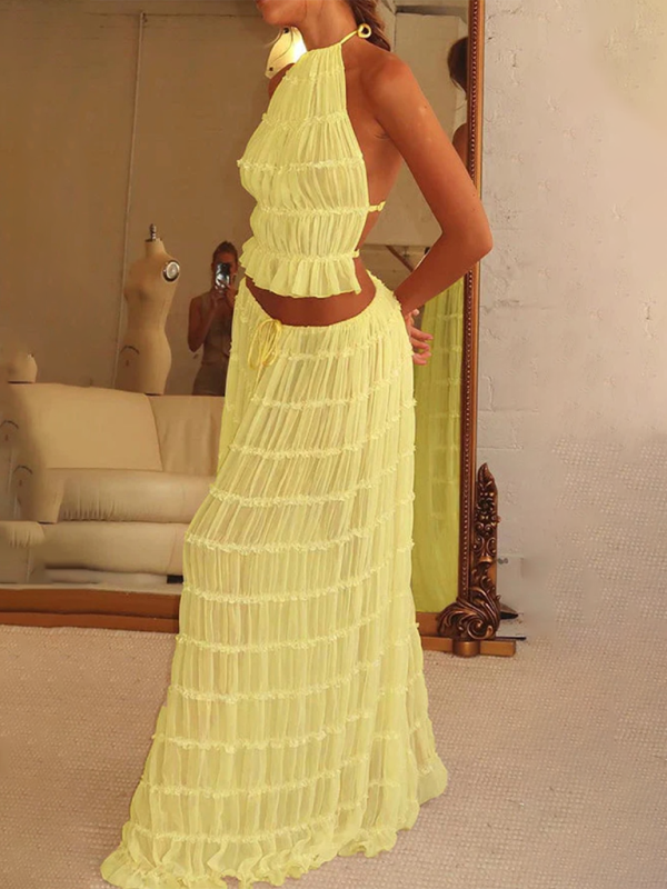Boho two-piece set
Resort wear outfit
Elegant summer set
Flowy beach outfit
Vacation-ready fashion
Chic crop top and pants set