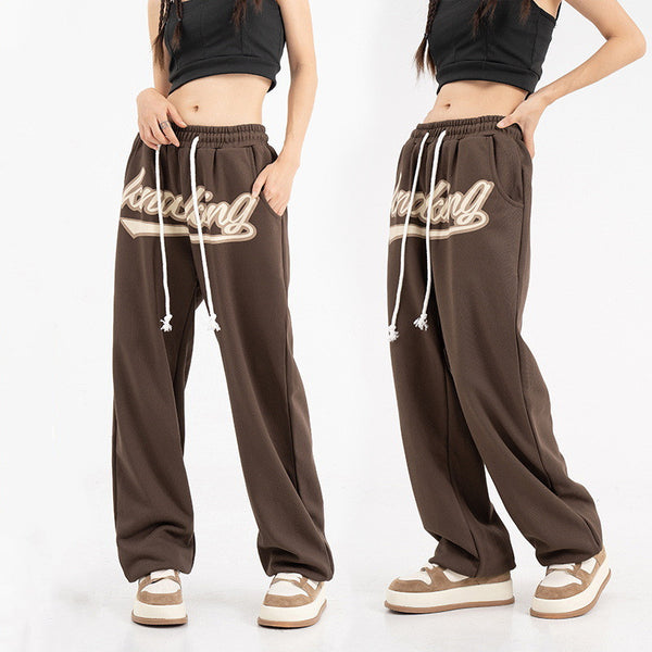 Unisex hip-hop sweatpants, streetwear joggers, relaxed fit pants, casual street style, urban fashion, lightweight joggers, breathable sweatpants, adjustable drawstring, multiple pockets joggers, street fashion trousers, versatile joggers, hip-hop wardrobe, trendy casual pants, athletic joggers, everyday sweatpants, gym joggers, lounging pants, stylish sweatpants, men’s streetwear, women’s casual joggers.