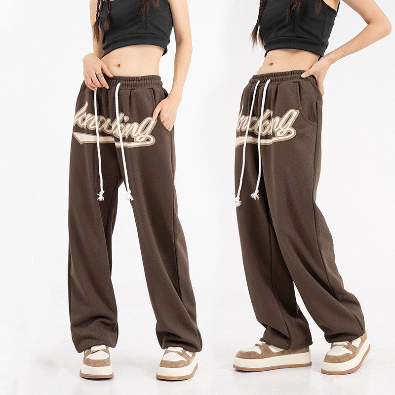 Unisex hip-hop sweatpants, streetwear joggers, relaxed fit pants, casual street style, urban fashion, lightweight joggers, breathable sweatpants, adjustable drawstring, multiple pockets joggers, street fashion trousers, versatile joggers, hip-hop wardrobe, trendy casual pants, athletic joggers, everyday sweatpants, gym joggers, lounging pants, stylish sweatpants, men’s streetwear, women’s casual joggers.