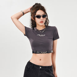 Buckle strap crop top
Streetwear short sleeve tee
Edgy Y2K fashion
Black fitted crop top for women
Grunge-inspired buckle tee