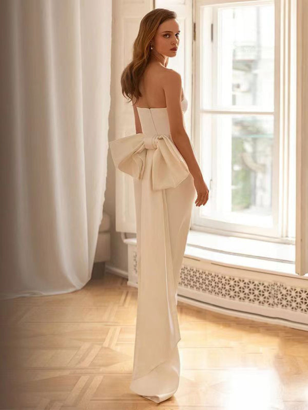 White tube top dress,
Slim fit dress,
Elegant dress,
Graceful bow back,
Women's slim dress,
Chic tube top dress,
Sophisticated evening dress,
Formal event dress,
Special occasion dress,
Stylish bow detail, Modern charm dress, Stylish evening wear,