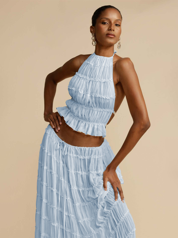 Boho two-piece set
Resort wear outfit
Elegant summer set
Flowy beach outfit
Vacation-ready fashion
Chic crop top and pants set