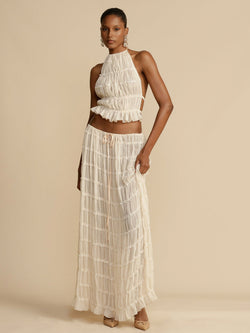 Boho two-piece set
Resort wear outfit
Elegant summer set
Flowy beach outfit
Vacation-ready fashion
Chic crop top and pants set