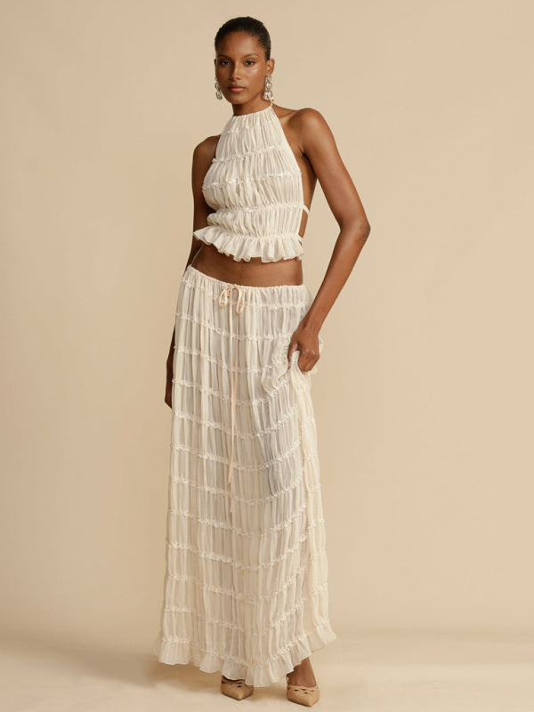 Boho two-piece set
Resort wear outfit
Elegant summer set
Flowy beach outfit
Vacation-ready fashion
Chic crop top and pants set