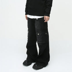 men's black cargo pants, wide-leg cargo pants, utility pants, high-waisted, multi-pocket, oversized, streetwear, cargo pants with pockets, relaxed fit, durable fabric, men’s pants, heavy-duty fabric, snap pockets, cargo pants for streetwear, functional design, trendy utility pants, black utility pants, men’s street style, relaxed oversized fit, versatile utility pants, basic tee styling, on-the-go wardrobe, modern utility fashion,
