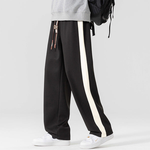 Men's wide-leg track pants
Streetwear pants for men
Casual sporty trousers
Relaxed fit track pants
Fashionable athletic pants