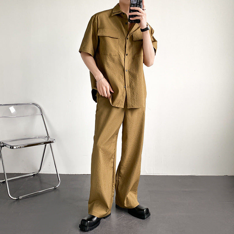 Men’s two-piece outfit
Stylish men’s matching set
Textured button-up shirt and pants
Streetwear fashion for men
Loose-fit men’s summer set
Casual wear for modern men