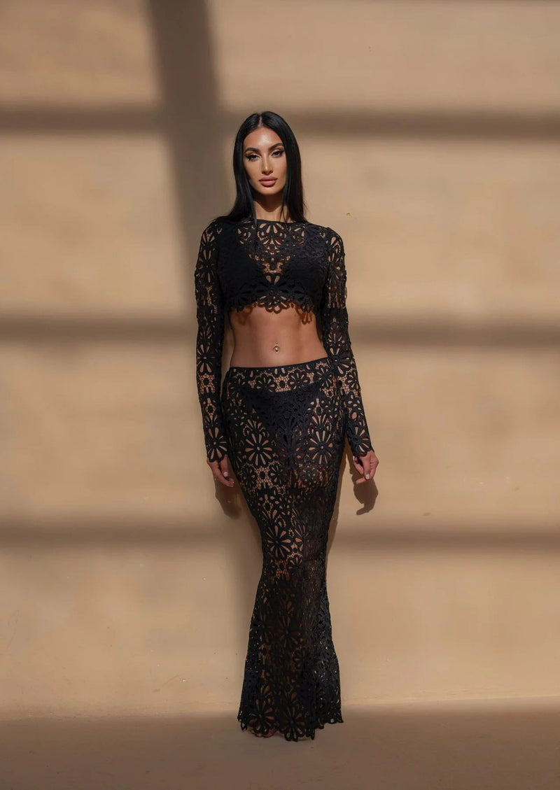 Black lace two-piece set
Sheer floral lace outfit
Elegant boho maxi skirt and top
Beach wedding guest dress
Vacation fashion for women
Chic honeymoon outfit