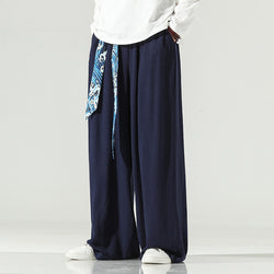 Men’s wide-leg harem pants,
Japanese-inspired pants,
Black harem pants,
Loose fit trousers,
Wide-leg trousers for men,
Boho-inspired pants,
Casual men’s pants,
Relaxed fit trousers,
Flowing pants for men,
Cultural fashion pants
Men’s casual trousers,
Contemporary men’s pants,
Unique men’s trousers,
Statement pants for men,
Stylish harem pants,
Blue wave pattern pants,
Men’s baggy pants.
Comfortable black trousers,
Trendy wide-leg pants,
Versatile harem pants,
Fashion-forward men’s trousers,