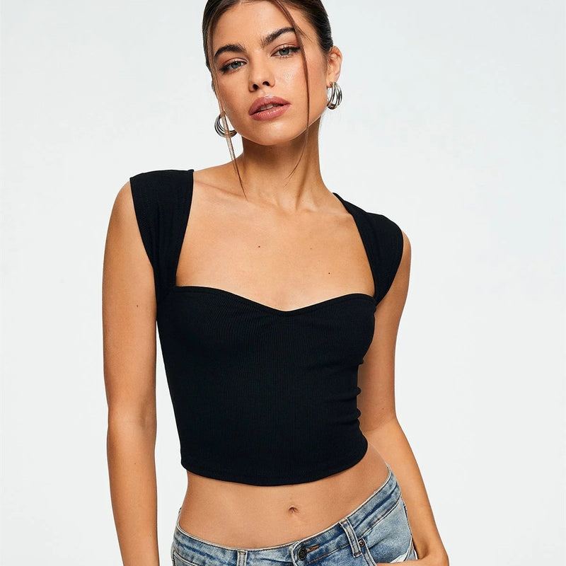Black ribbed crop top
Sexy sleeveless top
Women’s trendy fashion
Clubwear crop top
Fitted summer top
Casual chic outfit
Stylish party wear
Street style fashion
Trendy black top
Cropped tank top