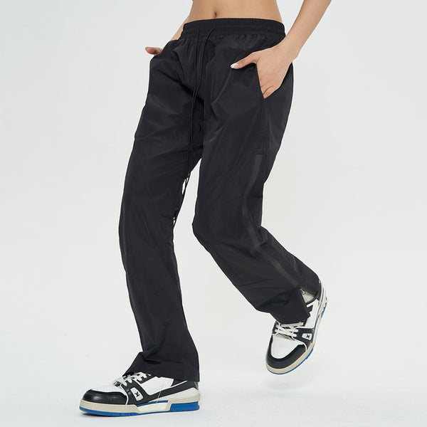 Black joggers for women
Streetwear windbreaker pants
Lightweight joggers with drawstring
Casual loose-fit pants
Urban fashion trousers
Athletic track pants
Comfortable sports joggers