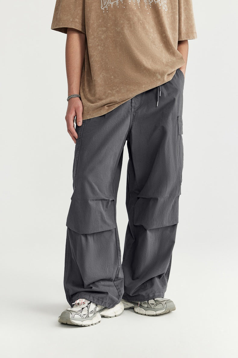Men's Wide-Leg Cargo Pants,
Olive Green Pants,
Utility Pockets,
Relaxed Fit Cargo Pants,
Oversized Streetwear,
Green Cargo Trousers,
Modern Cargo Pants,
Fashion-Forward Streetwear,
Wide-Leg Silhouette trousers, 
Urban Streetwear Pants,
Travel Pants,
Utility Fashion,
Bold Statement Pants,
Functional Cargo Pants,
Men's Fashion Trousers,
Loose Fit Pants,
Trendy Cargo Pants