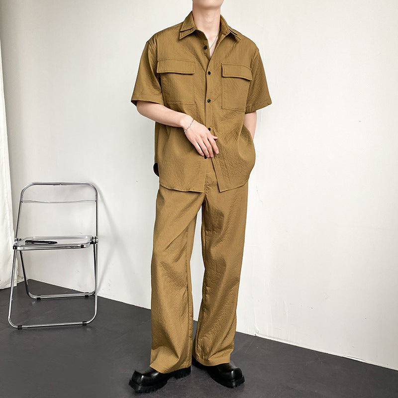 Men’s two-piece outfit
Stylish men’s matching set
Textured button-up shirt and pants
Streetwear fashion for men
Loose-fit men’s summer set
Casual wear for modern men