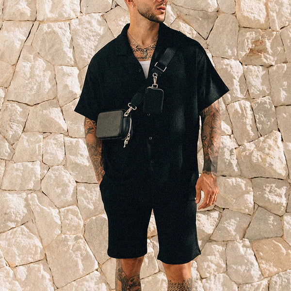 Men’s summer two-piece set
Light blue men’s vacation outfit
Beachwear outfit for men
Casual resort wear for men
Lightweight summer clothing
Men’s short sleeve button-up set