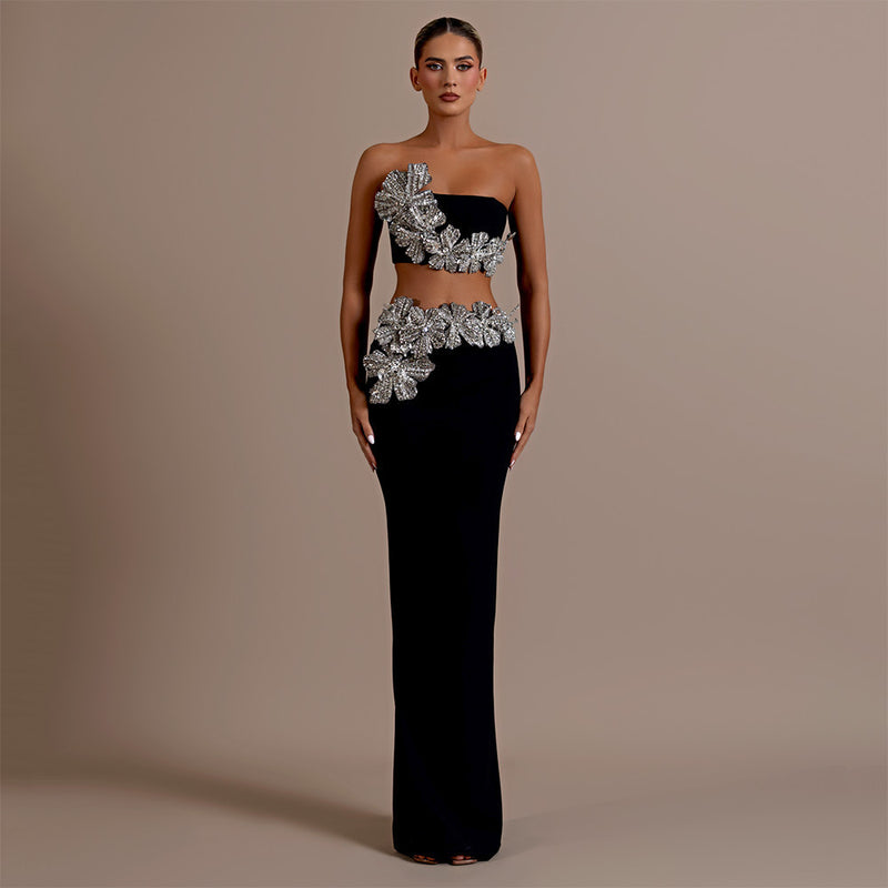 Black strapless evening gown
Embellished formal dress
Black crop top and skirt set
Embellished two-piece evening outfit
Luxury crystal gown
Elegant two-piece dress
Designer evening skirt and top
High-slit skirt with beaded top
Glamorous two-piece party set
Designer evening wear
Red carpet dress
Floral embellished tube gown
Beaded formal outfit