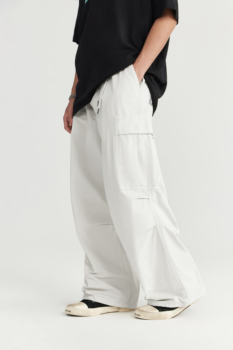 Men's Wide-Leg Cargo Pants,
Olive Green Pants,
Utility Pockets,
Relaxed Fit Cargo Pants,
Oversized Streetwear,
Green Cargo Trousers,
Modern Cargo Pants,
Fashion-Forward Streetwear,
Wide-Leg Silhouette trousers, 
Urban Streetwear Pants,
Travel Pants,
Utility Fashion,
Bold Statement Pants,
Functional Cargo Pants,
Men's Fashion Trousers,
Loose Fit Pants,
Trendy Cargo Pants