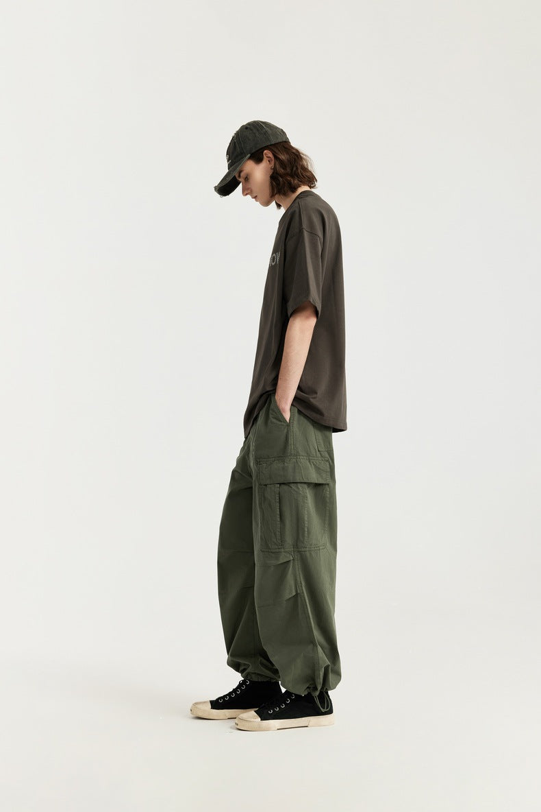 Men's Wide-Leg Cargo Pants,
Olive Green Pants,
Utility Pockets,
Relaxed Fit Cargo Pants,
Oversized Streetwear,
Green Cargo Trousers,
Modern Cargo Pants,
Fashion-Forward Streetwear,
Wide-Leg Silhouette trousers, 
Urban Streetwear Pants,
Travel Pants,
Utility Fashion,
Bold Statement Pants,
Functional Cargo Pants,
Men's Fashion Trousers,
Loose Fit Pants,
Trendy Cargo Pants