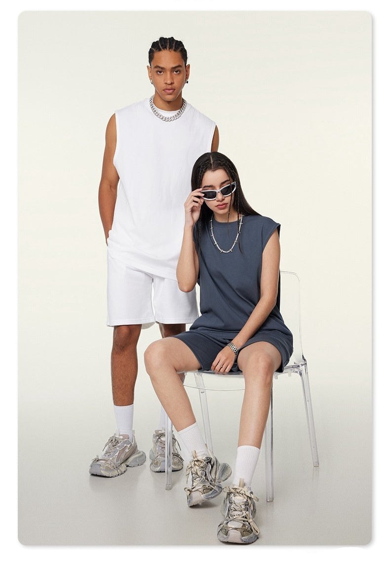 unisex tank top, oversized sleeveless tank, gender-neutral muscle tank, drop shoulder workout tank, relaxed fit gym tank, breathable oversized streetwear tank, minimalist fashion tank, trendy sleeveless oversized top