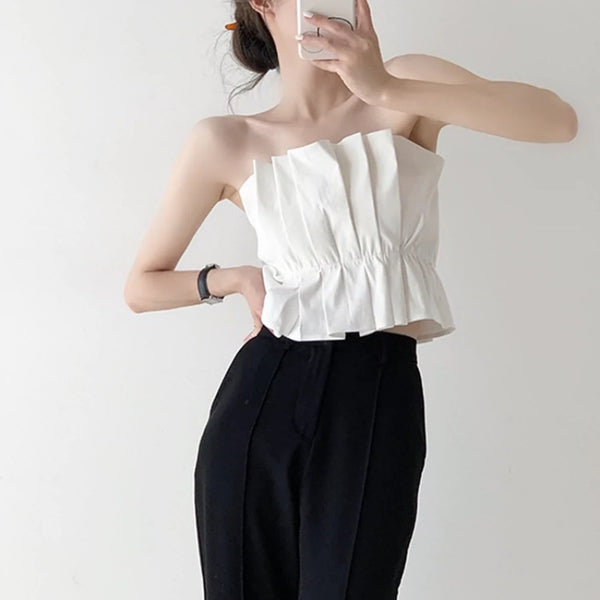 Strapless pleated top
Chic summer tube top
Elegant peplum blouse
Minimalist fashion top
Women's strapless blouse