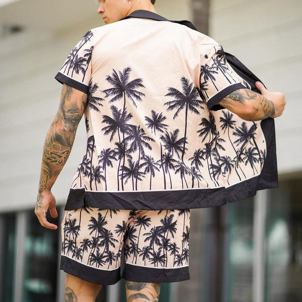 Men’s tropical print set
Hawaiian two-piece outfit
Vacation-ready men’s outfit
Beachwear for men
Lightweight summer set
Men’s resort wear