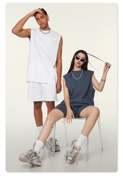 unisex tank top, oversized sleeveless tank, gender-neutral muscle tank, drop shoulder workout tank, relaxed fit gym tank, breathable oversized streetwear tank, minimalist fashion tank, trendy sleeveless oversized top

