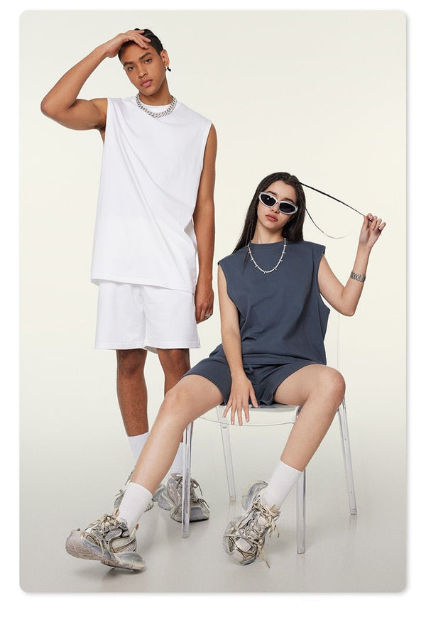 unisex tank top, oversized sleeveless tank, gender-neutral muscle tank, drop shoulder workout tank, relaxed fit gym tank, breathable oversized streetwear tank, minimalist fashion tank, trendy sleeveless oversized top

