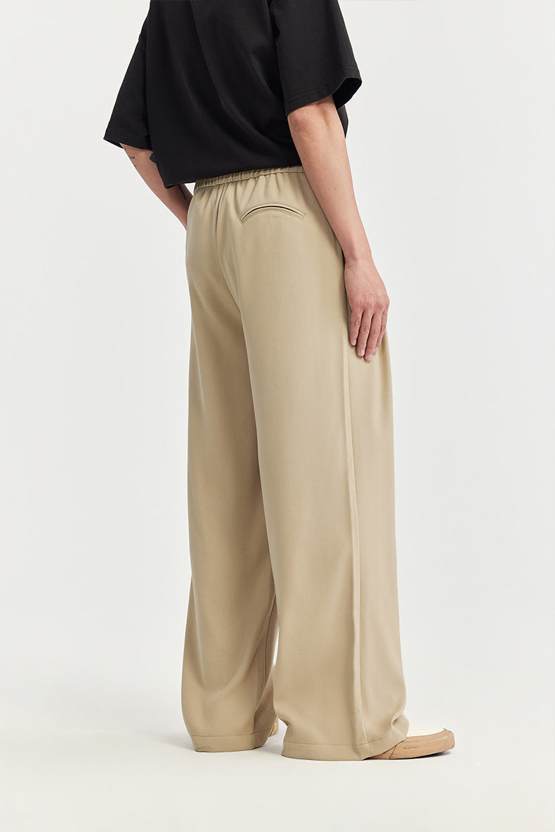  unisex trousers, relaxed fit trousers, wide-leg pants, minimalist aesthetic, oversized silhouette, luxury fashion, high-quality fabric, old money style, refined style, timeless trousers, upscale leisure, flowy pants, elastic waistband, classic trousers, effortless vibe, comfortable chic, streetwear trousers, pleated pants, casual luxury, versatile unisex fashion, statement pants, upscale casual, refined trousers, classic oversized,