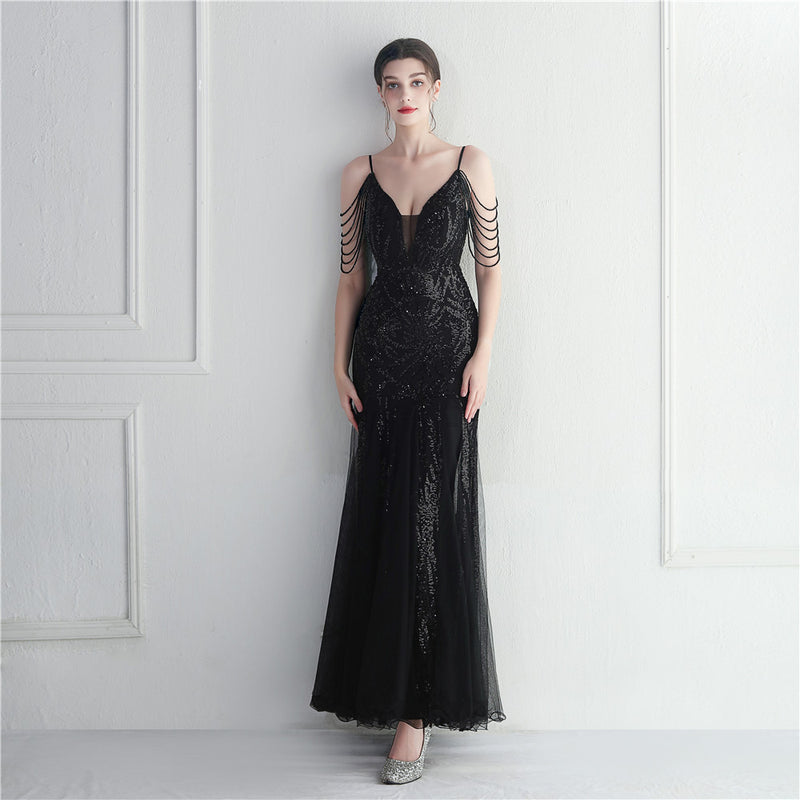 Black evening gown
Sequin formal dress
Luxury evening dress
Designer gown for women
Elegant party dress
Wedding guest dress
Red carpet evening wear
Formal event gown
Shoulder chain dress
Deep V-neck gown
Floor-length sequin dress