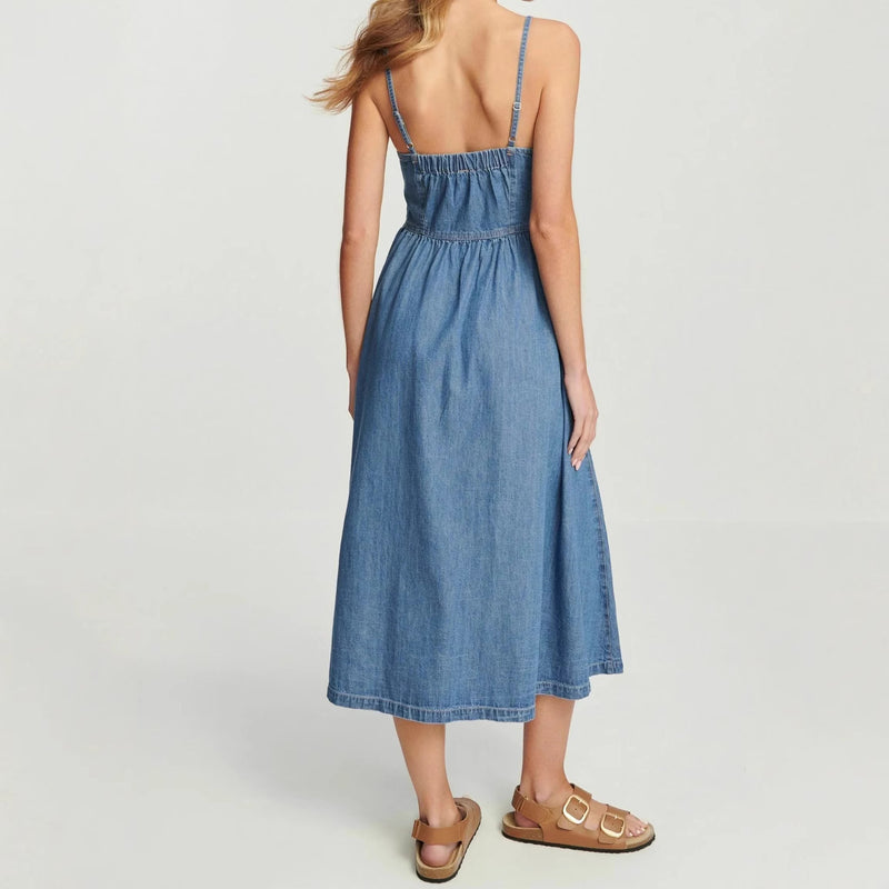 adjustable strap denim dress

button-down cotton denim midi

casual denim outfit for women

sleeveless dress for summer vacation

denim travel dress for women

simple everyday denim dress

