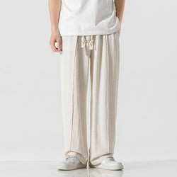 Men’s linen pants, wide leg linen trousers, drawstring pants men, rope tie pants, natural fabric trousers, loose fit summer pants, casual beach pants, boho men’s clothing, relaxed fit men’s fashion, minimalist men’s pants