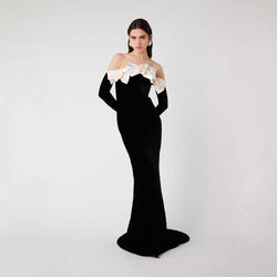 Black velvet gown, off-shoulder evening dress, white floral gown, formal black dress, gala outfit, long elegant dress, luxury evening wear, red carpet dress, fitted formal gown, women’s event dress