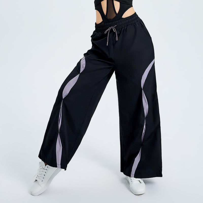 parachute pants, wide-leg joggers, streetwear pants, trendy joggers, women’s casual pants, loose-fit pants, Y2K fashion, urban streetwear, sporty pants, fashion joggers.