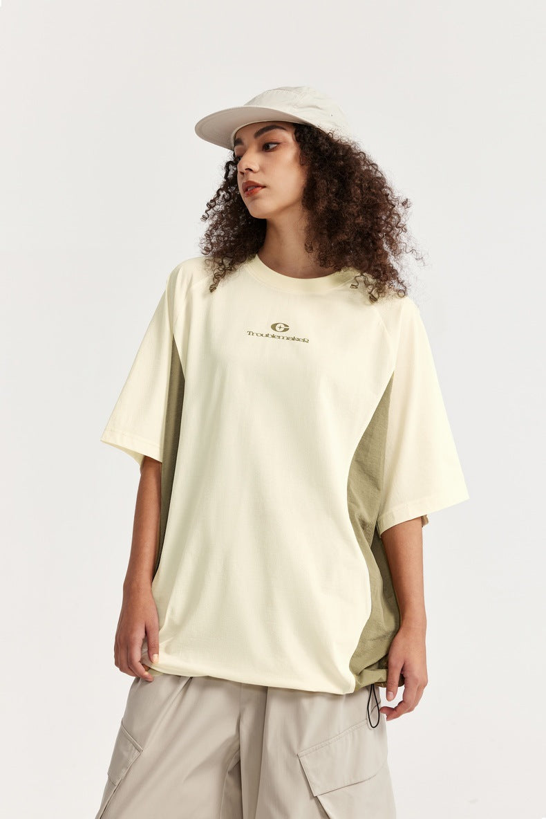  Unisex oversized T-shirt, streetwear fashion, gender-neutral T-shirt, contrast panel tee, trendy urban clothing, loose fit T-shirt, modern casual top