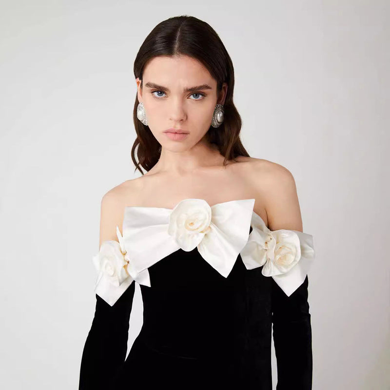 Black velvet gown, off-shoulder evening dress, white floral gown, formal black dress, gala outfit, long elegant dress, luxury evening wear, red carpet dress, fitted formal gown, women’s event dress