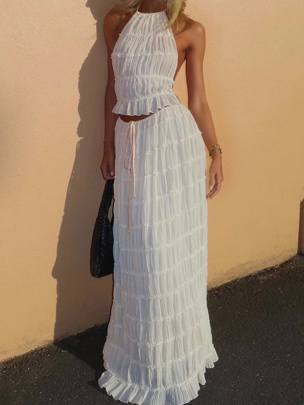 Boho two-piece set
Resort wear outfit
Elegant summer set
Flowy beach outfit
Vacation-ready fashion
Chic crop top and pants set