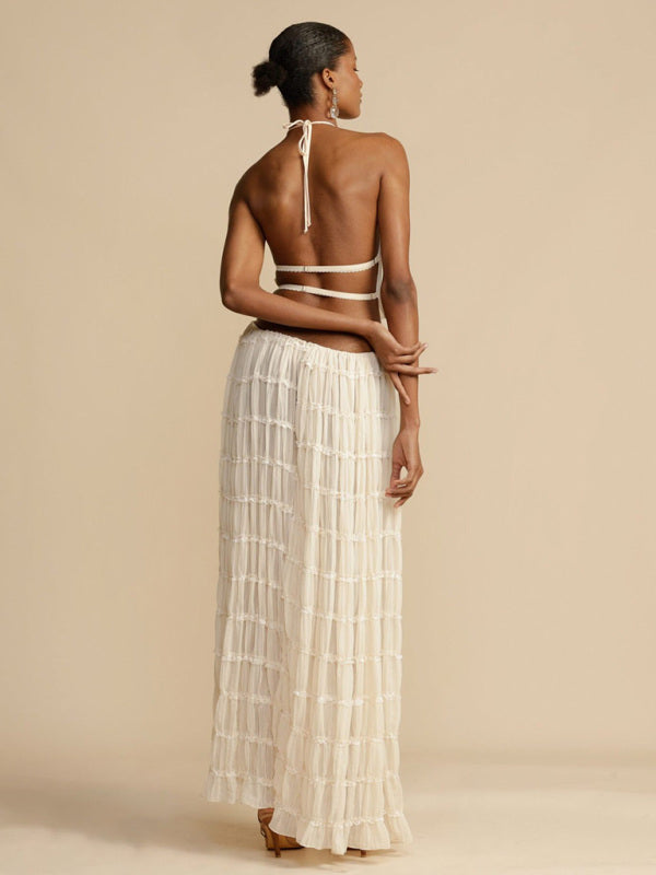 Boho two-piece set
Resort wear outfit
Elegant summer set
Flowy beach outfit
Vacation-ready fashion
Chic crop top and pants set