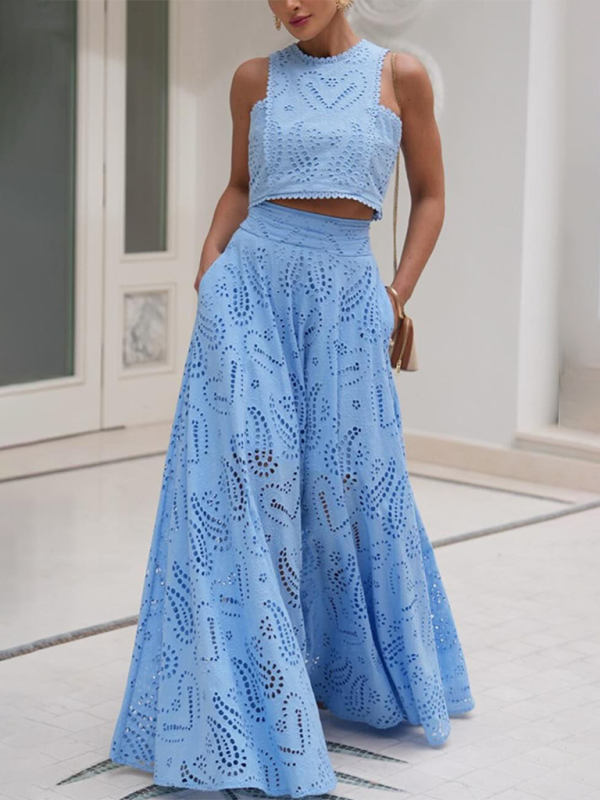 Elegante vestido rosa de vacaciones de dos piezas con ojales: top corto y falda larga 