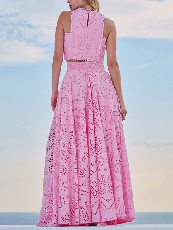 Elegante vestido rosa de vacaciones de dos piezas con ojales: top corto y falda larga 