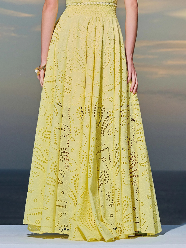 Elegante vestido rosa de vacaciones de dos piezas con ojales: top corto y falda larga 