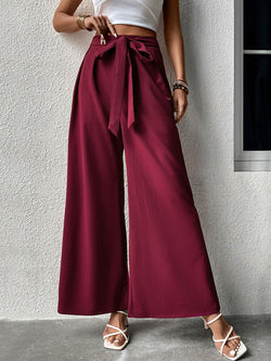 high-waisted pants, wide-leg trousers, palazzo pants, belted dress pants, elegant women’s trousers, classy work pants, stylish palazzo trousers, chic office pants, trendy wide-leg pants, sophisticated fashion trousers.