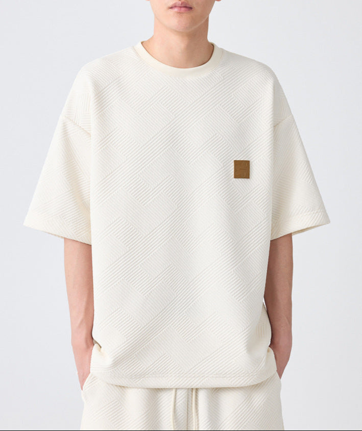luxury lounge set
premium textured outfit
embossed t-shirt and shorts
oversized tee and shorts set
streetwear fashion
Casual co-ord set for men
Casual men’s co-ord set
Knitted cord set
cozy summer outfit
minimalist casual wear
soft-touch lounge set