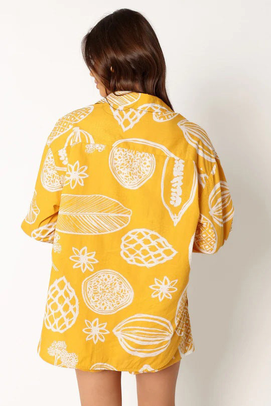 printed two-piece tropical outfit

casual matching lounge sets

women’s summer matching sets

resort wear for women

trendy fruit print clothingtropical fruit print outfit

button down co-ord set

women’s resort set

elastic waist tropical shorts

two piece casual lounge set

relaxed fit vacation outfit

