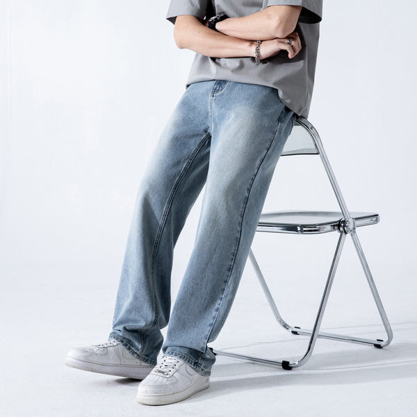 men's vintage jeans, relaxed straight-leg denim, light wash jeans, retro denim pants, casual streetwear jeans, baggy fit jeans, soft denim pants, classic blue jeans.