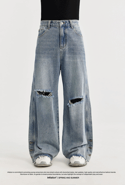 men's wide-leg jeans, ripped denim, vintage wash jeans, baggy streetwear jeans, loose-fit jeans, trendy men's denim, casual street style, frayed knee jeans, urban fashion.