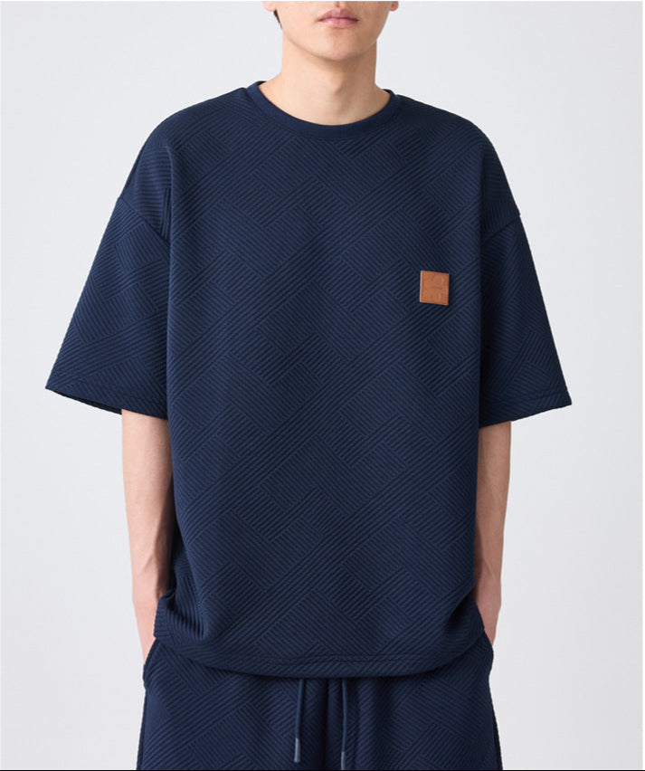 luxury lounge set
premium textured outfit
embossed t-shirt and shorts
oversized tee and shorts set
streetwear fashion
Casual co-ord set for men
Casual men’s co-ord set
Knitted cord set
cozy summer outfit
minimalist casual wear
soft-touch lounge set